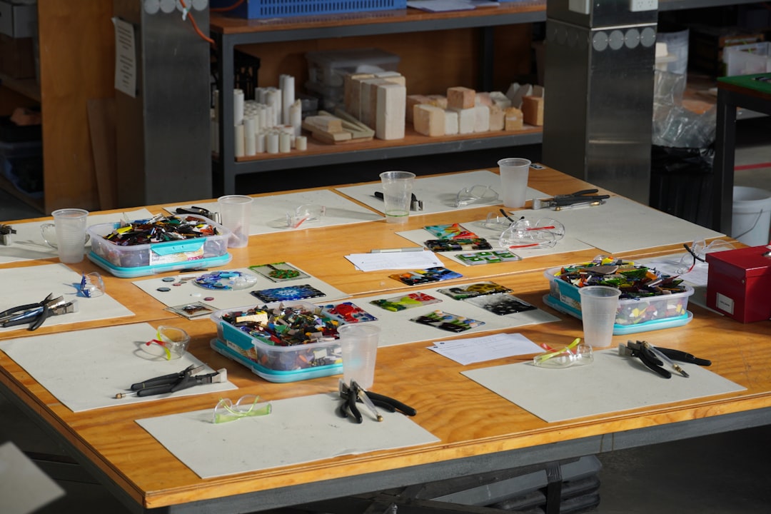 Colorful art supplies organized on a workspace