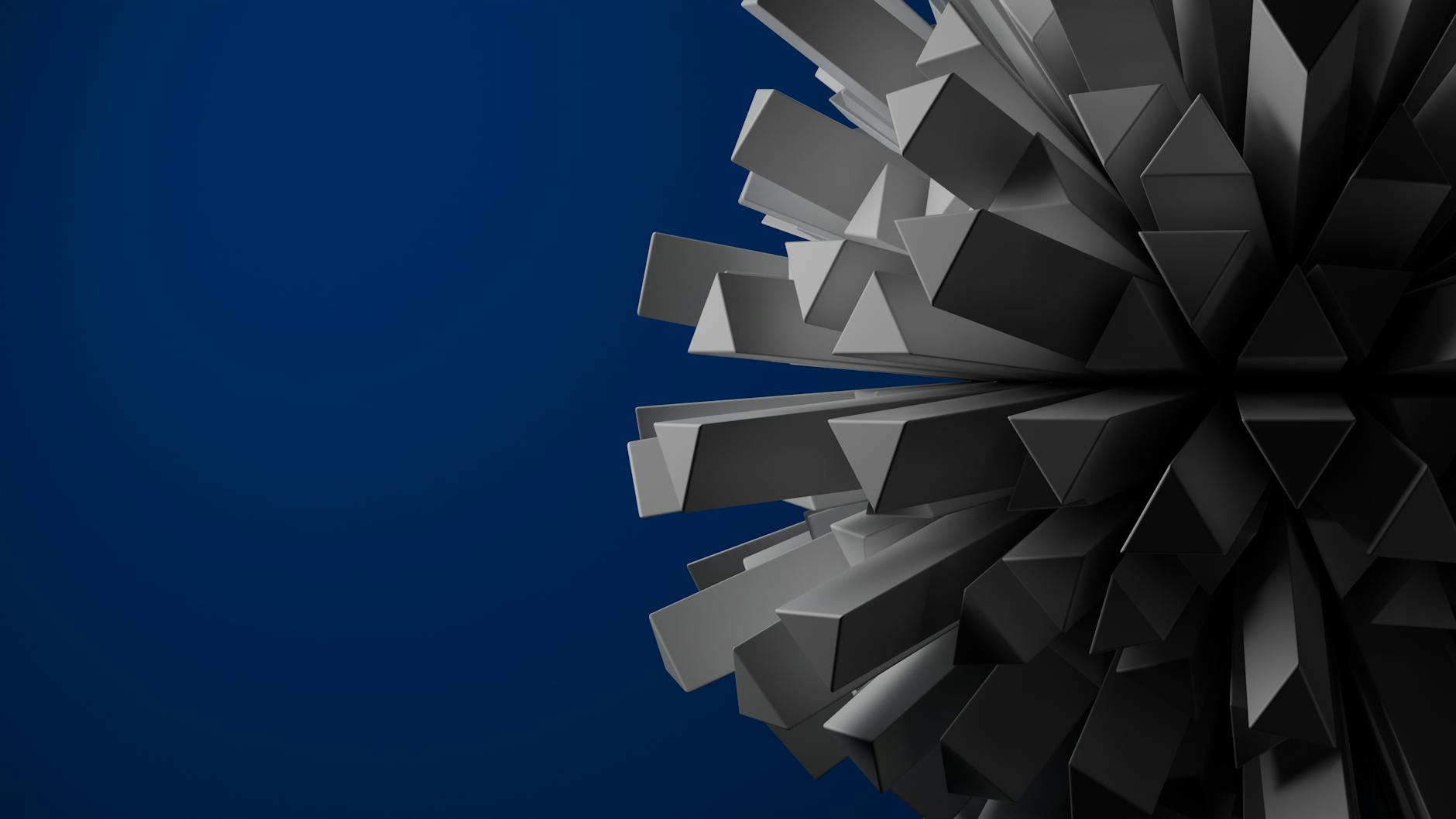 Dynamic 3D geometric shapes against deep blue backdrop