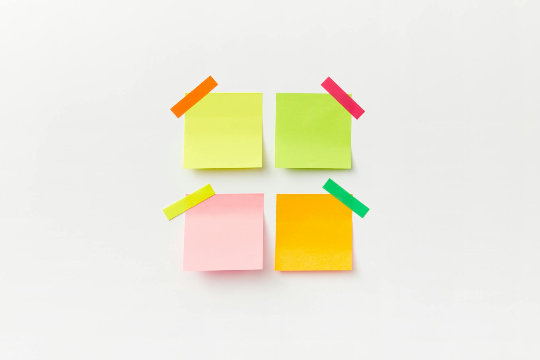 Colorful sticky notes on a clean surface, organized study planning